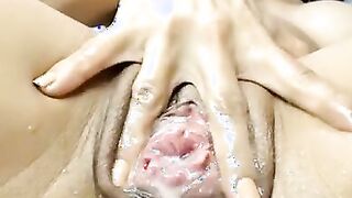 Horny Latina masturbates and squirts
