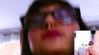 slender chick with big glasses at homemade point of watch casting