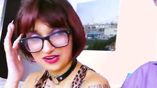 slender chick with big glasses at homemade point of watch casting