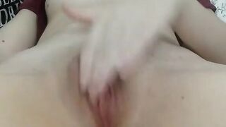 Amateur cam model fingers her tight pussy