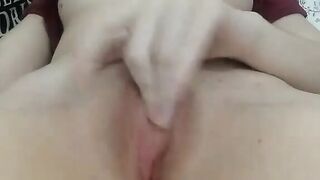 Amateur cam model fingers her tight pussy