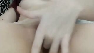 Amateur cam model fingers her tight pussy