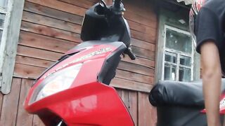 Biker bimbos masturbates on her red motorcycle