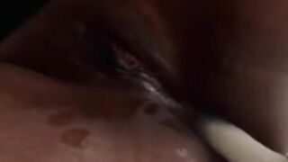 pounding dildo in African butthole