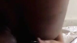 pounding dildo in African butthole