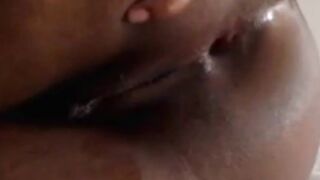 pounding dildo in African butthole