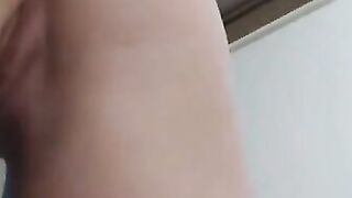 Sexy Chick oils up her big tits and ass