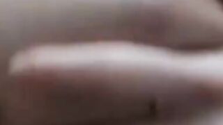 Sexy Chick oils up her big tits and ass
