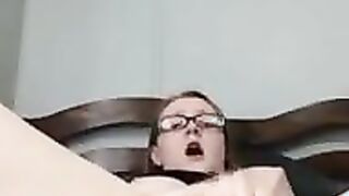 Nerdy Chick fucks her wet pussy on webcam