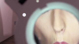 Gigantic-tits goddess studies her unshaved twat with a magnifying glass