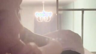 Blonde hairdresser blows on a huge meat pole