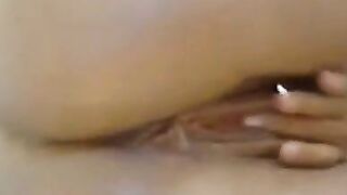 Lovely Chick fingering her pussy and ass