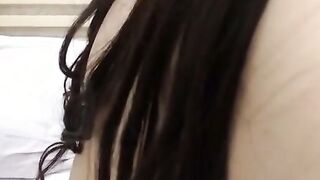 Horny Asian Babe in Fishnet masturbates