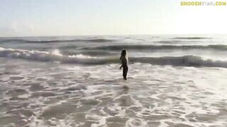Surfer cunt with mouth masturbating on beach