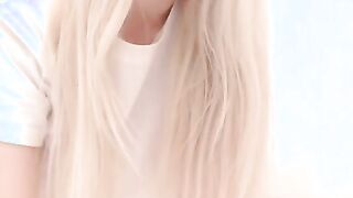Petite Blonde Babe bends over and shows her lovely ass