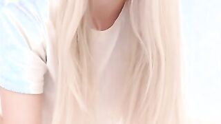 Petite Blonde Babe bends over and shows her lovely ass