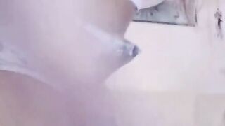 Hot Latina with big juicy ass fucks her pussy