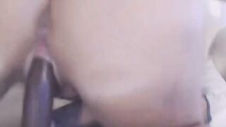 Hot Latina with big juicy ass fucks her pussy