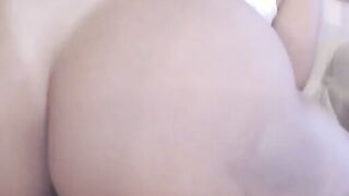 Hot Latina with big juicy ass fucks her pussy