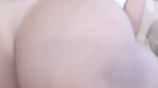 Hot Latina with big juicy ass fucks her pussy