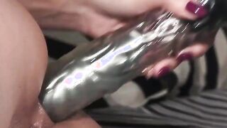 Stunning petite chick fucks her tight asshole with a humongous sex toy