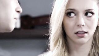 Slender blonde help customer while shes rimmed behind counter
