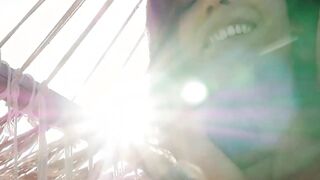 Petite beauty stripping to take sunbath