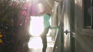 Petite beauty stripping to take sunbath