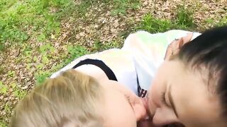 Two Girlfriends Suck Cock in the Wood