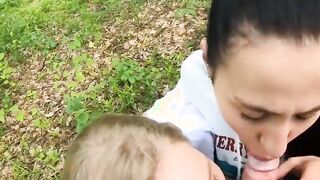 Two Girlfriends Suck Cock in the Wood