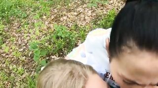 Two Girlfriends Suck Cock in the Wood