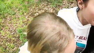 Two Girlfriends Suck Cock in the Wood
