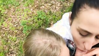 Two Girlfriends Suck Cock in the Wood