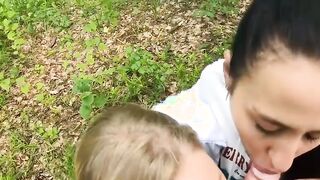 Two Girlfriends Suck Cock in the Wood