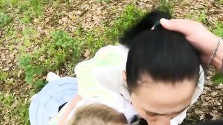 Two Girlfriends Suck Cock in the Wood