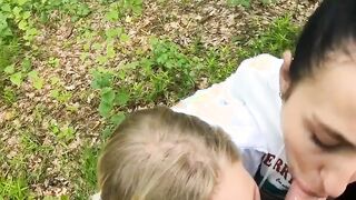 Two Girlfriends Suck Cock in the Wood