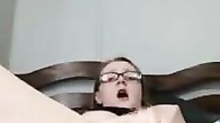 Nerdy Babe fingering her wet pussy