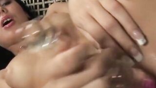 Slutty Bae dark hair mistress gets nude & fucks wet cunt with toy