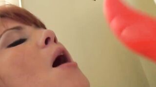 Beauty flirty red haired loves to play with her vibrator & film it