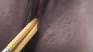 Long-tit dark hair Megan Jones inserts objects in her wet pussy