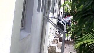 Latina lover licks her man's cock in public