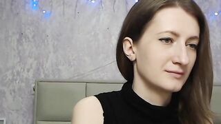 Brunette amateur with naked shoulders on webcam