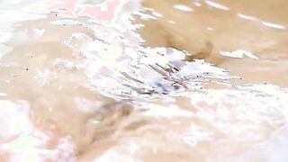 A stunning blonde with a generous bosom engages in passionate intercourse within the