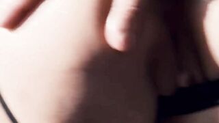 An intense doggy-style encounter with a girl wearing black stockings, her oiled-up as