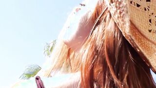Naked red Krystal Kitten posing outdoor