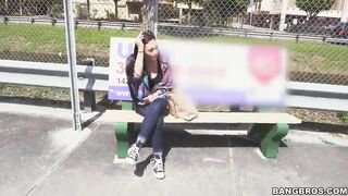 She's waiting at the bus stop and a man surprises her.