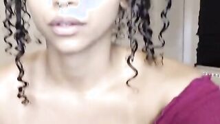 Busty Ebony masturbating with her Lush