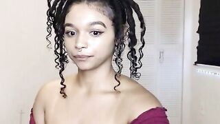 Busty Ebony masturbating with her Lush