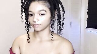 Busty Ebony masturbating with her Lush
