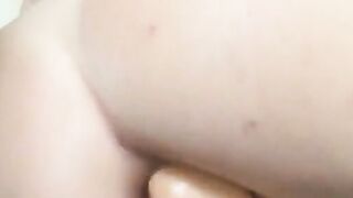 Petite Babe sucks and fucks her dildo in 3 holes
